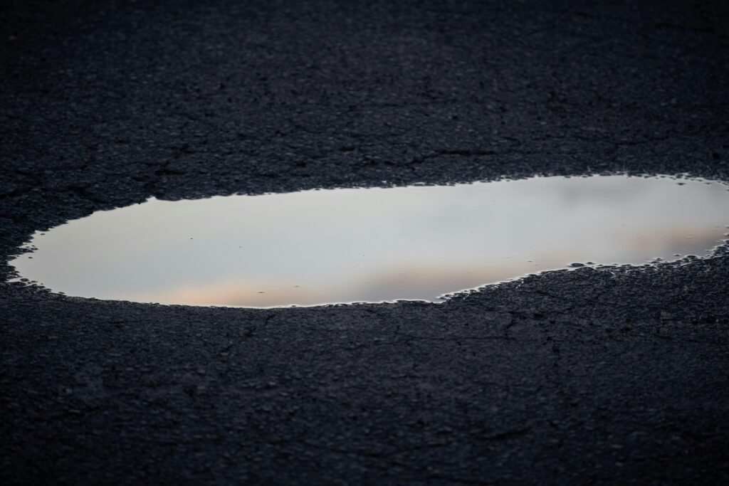 Pothole Damage - courtesy van, express car body repair